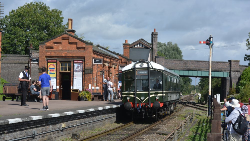 Scenes of diesel multiple unit Derby Lightweight DMU M79900 (Driving Motor Brake Second (DMBS)) standing in Quorn and Woodhouse station with a Loughborough Central to Leicester North stations, Great Central Railway heritage weekend Gala 'Railways at Work' (GCR August 2023)