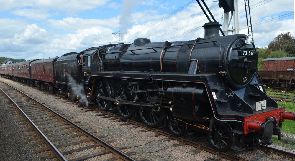 Standard Class locomotive 5MT 73156 waiting in the loop of Swithland Sidings with a passenger train from Loughborough to Leicester, Great Central Railway heritage weekend Gala 'Railways at Work' (GCR August 2023)