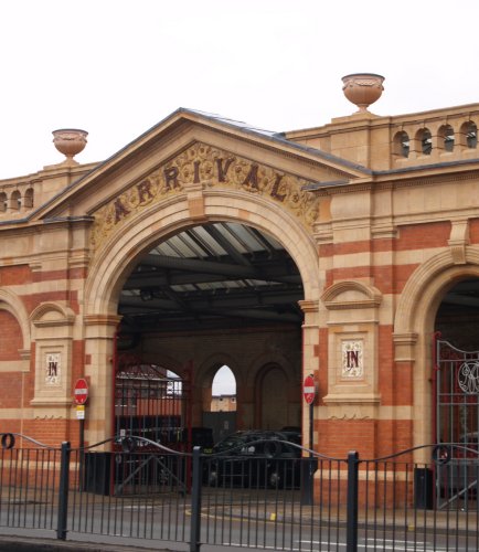 Trainspotting Leicester Station: On the left some details of the fine brick and stone architecture of the front facade of Leicester Station in London Road. Just down the road from the station is a statue of Thomas Cook (1808-1892), the Victorian founder of the famous travel agency who ran his first excursion train from Leicester station in 1841. The travel company he founded was continued by his son to become one of the largest holiday companies in the UK.