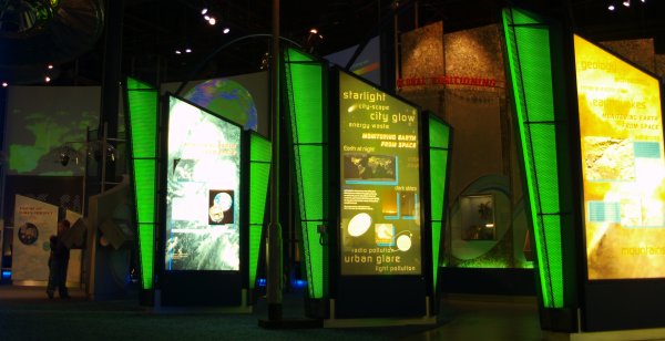 Lots of displays explaining what satellites can do orbiting Earth e.g. geographical surveys, weather monitoring and other investigating the surface and atmospheres of planets like Mars, Saturn etc. The National Space Centre, Leicester, England, English Midlands