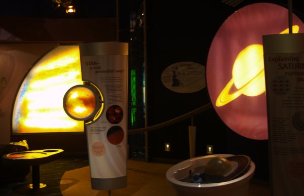 Lots of displays explaining what satellites can do orbiting Earth e.g. geographical surveys, weather monitoring and other investigating the surface and atmospheres of planets like Mars, Saturn etc. The National Space Centre, Leicester, England, English Midlands