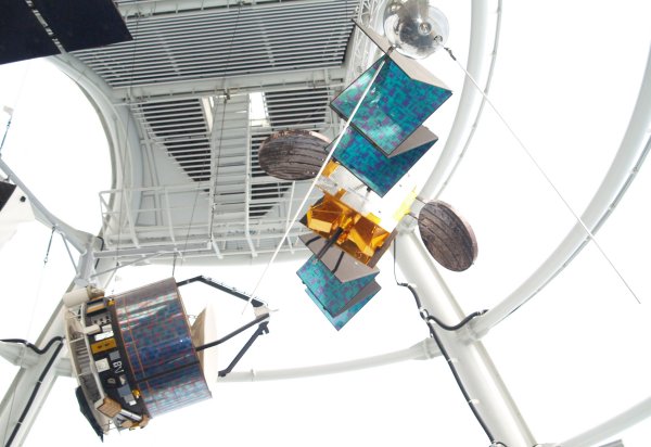 Suspended satellites, with wires NOT gravity! The National Space Centre, Leicester, England, English Midlands