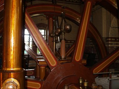 The giant wheels of the steam pumping engine contrast somewhat with the little steam train locomotive that trundles around the Abbey Pumping Station, and a great little ride for the 'kids' of any age! The Abbey Pumping Station Museum of Science and Technology, Leicester, England, English Midlands