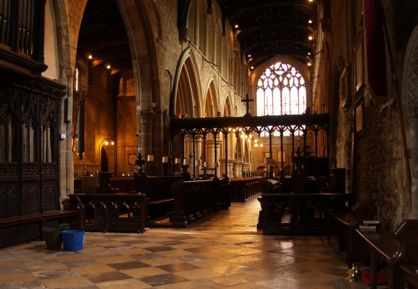 Looking west down the nave to the west window (details below). The internal architecture of St Mary de Castro Church, City of Leicester, England, English Midlands