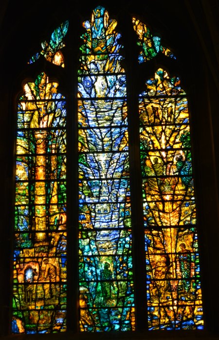 millennium stained glass windows by the artist Thomas Denny in Tewkesbury Abbey Gloucestershire England