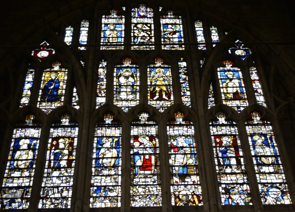 details of the medieval stained glass panels of the Great West Window of Great Malvern Priory Church Worcestershire England