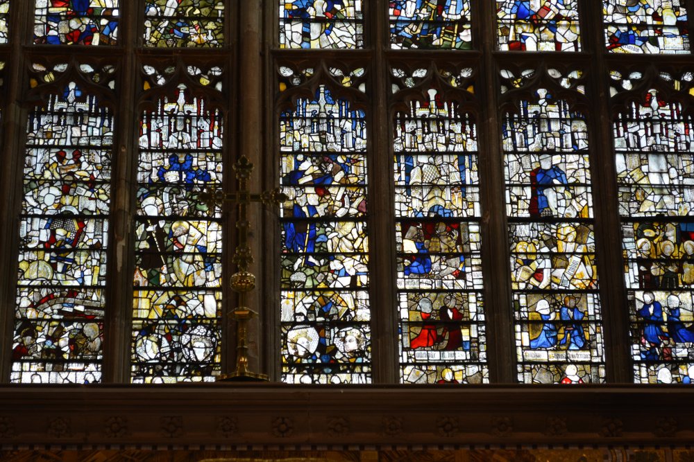 Details of the medieval stained glass panels Great East Window of Great Malvern Priory Church Worcestershire England