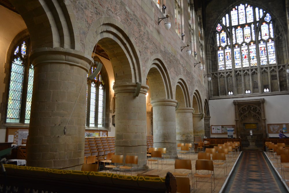  nave columns of the south aisle and the great west window of Great Malvern Priory Church Worcestershire England