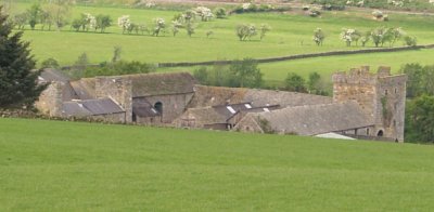 In the distance is a 13th-17th century fortified house called Willimontswick. (enlarged below)