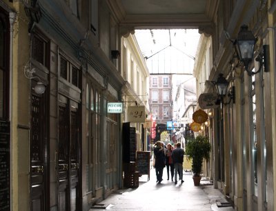 Its not all big stores in Paris, there are many narrow streets and arcades full of interesting small shops and cafes (?).