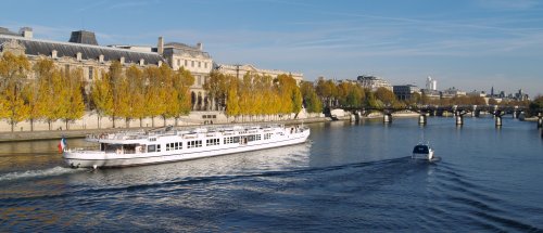 Tourist cruise boats are a most popular way to see the many elegant buildings on the banks of the River Seine.