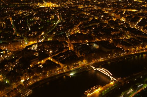 We finally reached the top of the Eiffel Tower at 8pm! (2000 hr) to look down at the bright lights of Paris, the River Seine, the illuminated Passerelle Bridge and Arc de Triomephe at the top left.