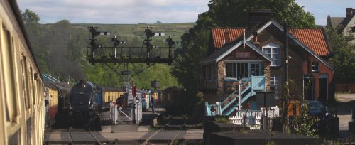Arriving in Grosmont Station as the famous LNER 4-6-2 A4 pacific locomotive Sir Nigel Gresley is ready with a train bound for Pickering.