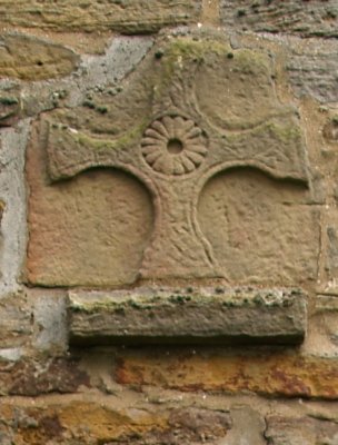The Anglian cross built in above the west door dates from the 8th century.