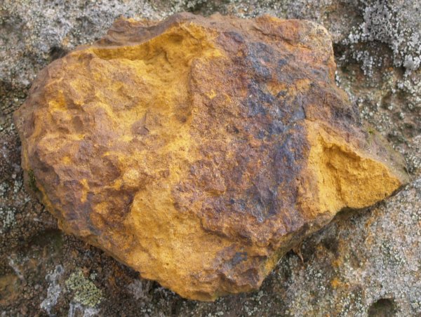 21b. Iron bearing rock, Oakley Walls, Esk Valley, North Yorkshire, England - typical of rock found in the nearby Cleveland Hills from which the iron and steel industry of Teesside was originally founded.