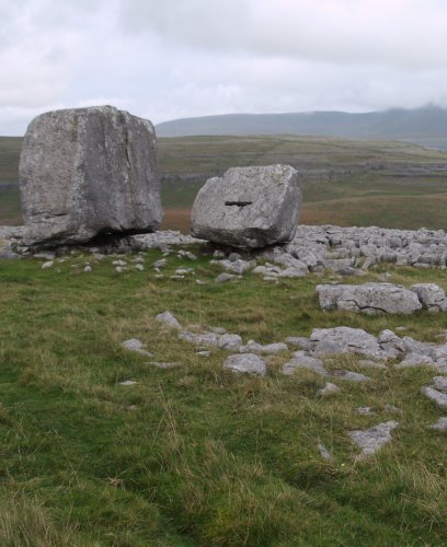 13. The Stones, glacial deposition above Ingleton (Yorkshire Dales, England), brooding Ingleborough in the background.