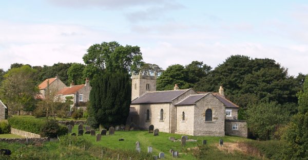 Last view of St Michael's Church as you head east down the stony track of Low Field Lane - Walking from Sutton Bank National Park Visitor Centre, North York Moors National Park, North Yorkshire, Northern England