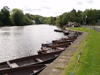 Looking up river by the rowing boats - Ruswarp on the River Esk near Whitby, North Yorkshire, Northern England