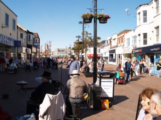 Street musicians playing in the main shopping area - Redcar, Cleveland, North-East England