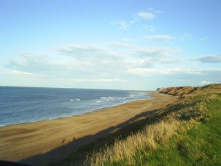 The beach looking towards Whitby - Sandsend, on the coast near Whitby, North Yorkshire