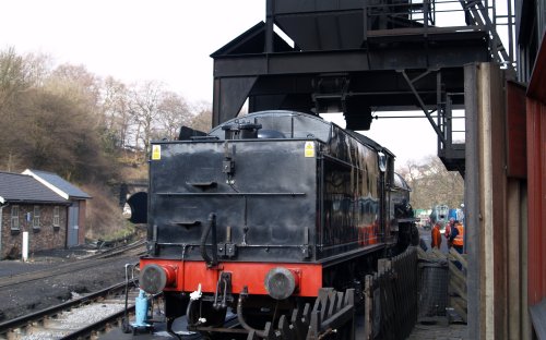 Locomotive 62005 coaling up before heading down through the tunnel on the left to Grosmont station.