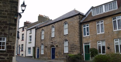 Buildings on the main street heading down to the harbour.