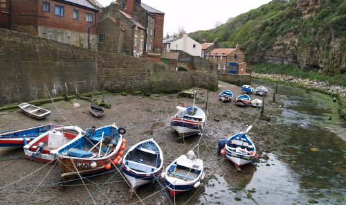 Moored fishing cobbles-boats where the river runs into the harbour.