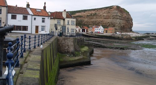 Staithes Harbour and the north-east cliff head.