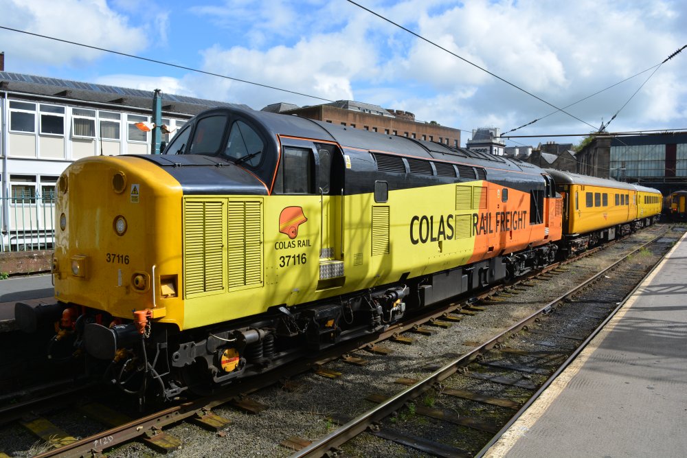 Colas Rail's Class 37 diesel loco 37116 at the head of a Network Rail test train at Carlisle station entered service in 1963 as D6816 and is operated by Colas Rail.