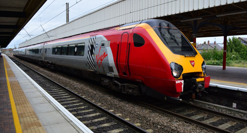 Trainspotting at Warrington Bank Quay station Class 221 DMU train at Warrington, with a Virgin Train service from Glasgow Central to London Euston via Birmingham New Street