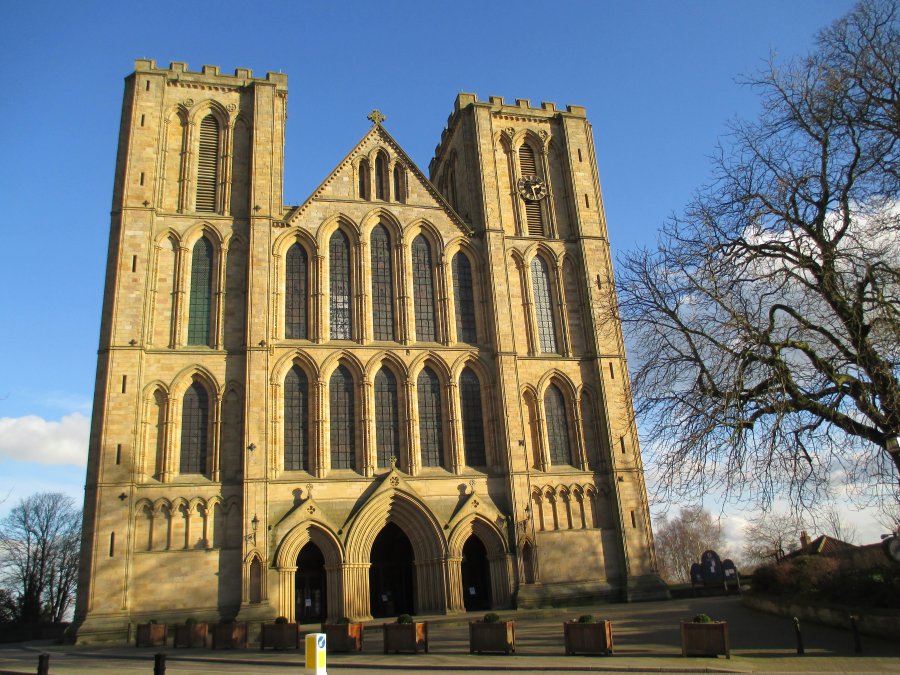 The glorious west front of Ripon Cathedral with all its carved pointed arches and decorated doorways