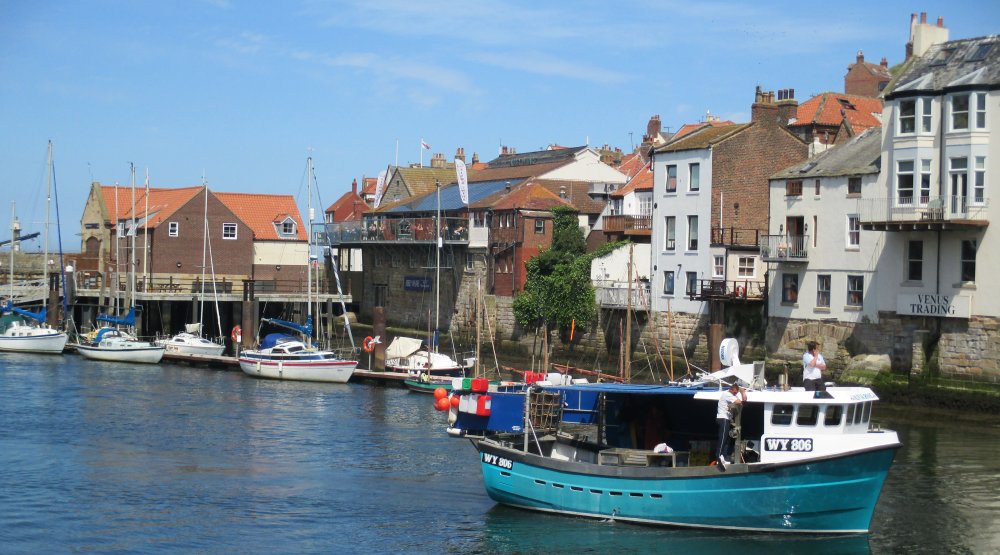Potter fishing boat WY 806 OLIVIA ROSE heading for the swing bridge in lower Whitby Harbour.