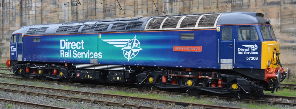 DRS Class 57 diesel locomotive 57308 Jamie Ferguson 'Thunderbird' relief duty Carlisle station