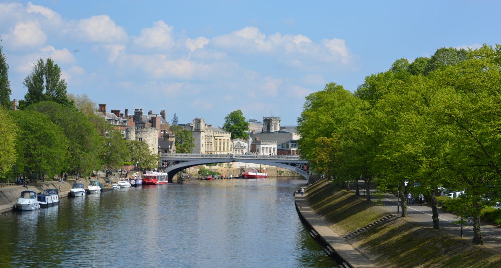 River bank views of the River Ouse looking towards Lendal Bridge, York