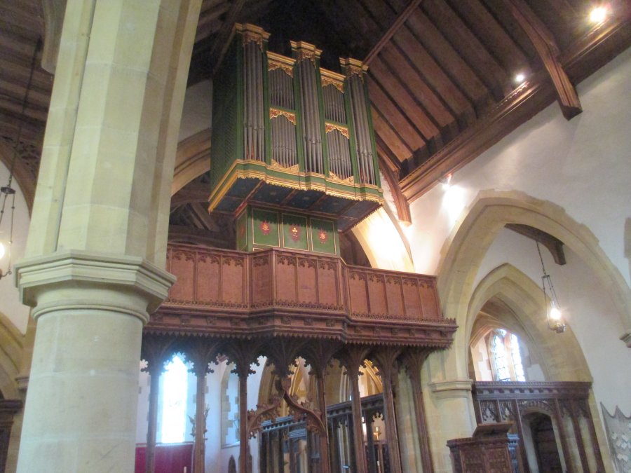 Rood screen and organ of St Oswald's Church, Lythe, North Yorkshire