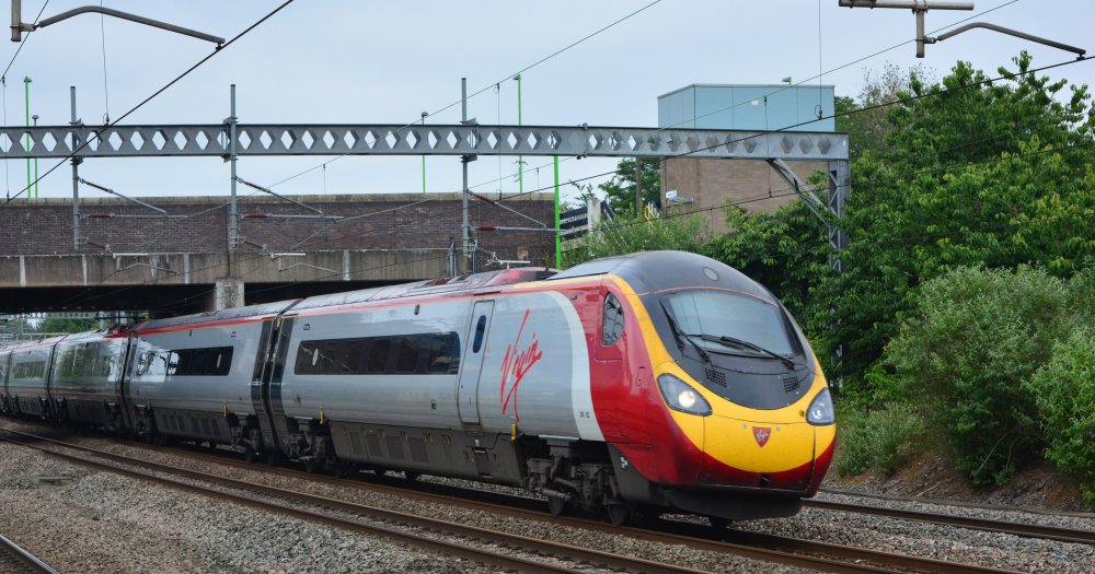 Virgin service to London Euston paasing through Tamworth station ALSTOM Class 390 390152 Pendolino 'tilting' EMU trains