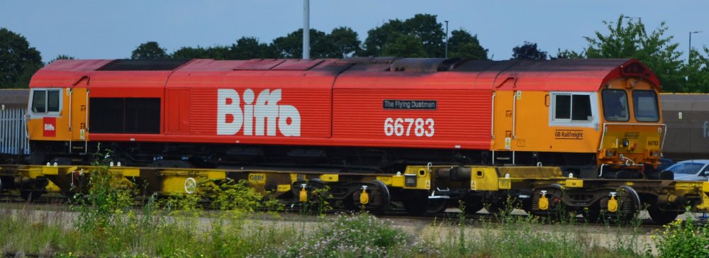 Class 66 diesel locomotive 66783 The Flying Dustman red Biffa livery Peterborough GBRF fuelling point depot