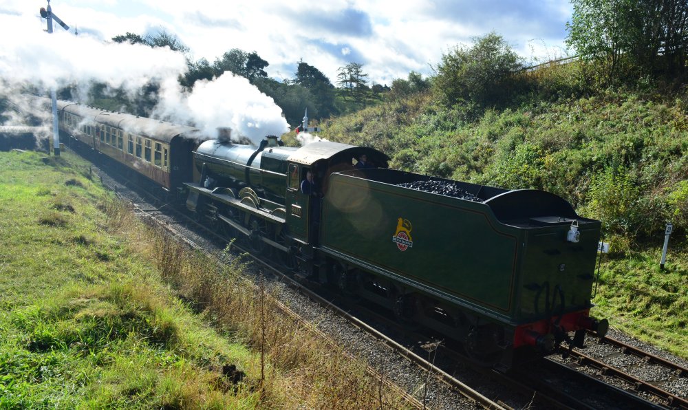 Passenger train entering Goathland station NYMR 6990 Witherslack Hall GWR Modified Hall steam locomotive