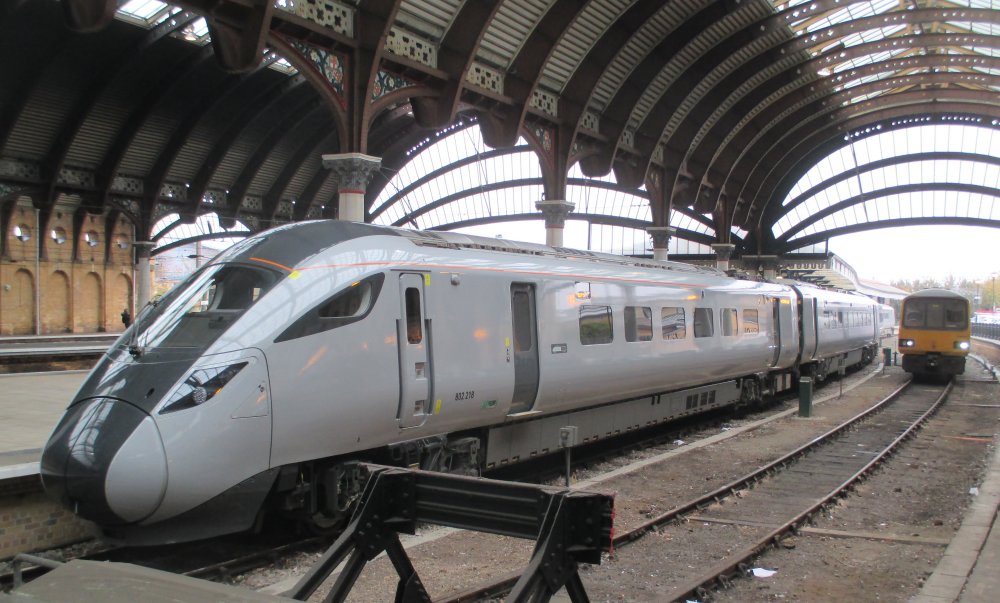 In plain silver grey livery Class 802 sub-class 802/2 unit 802218 in York Station