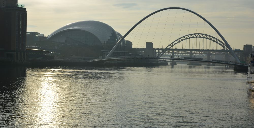dusk view from Ouseburn west down the River Tyne towards the Sage and Tyne Bridges