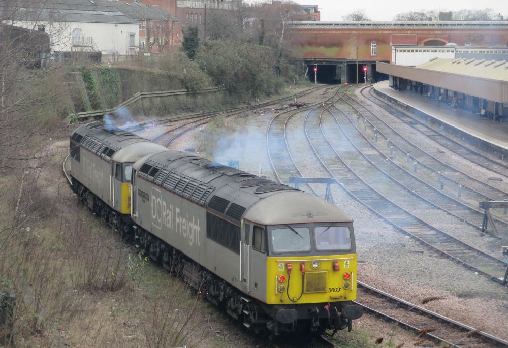 DC Rail Freight livery Class 56 diesel locomotives 56091 56103 leaving the Leicester yard of UK Rail Leasing