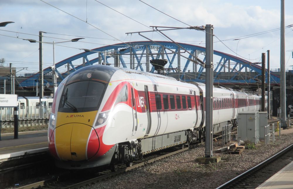 TRAINSPOTTING Entering Peterborough Station, Class 801 EMU train from Kings Cross with an LNER AZUMA service to Leeds