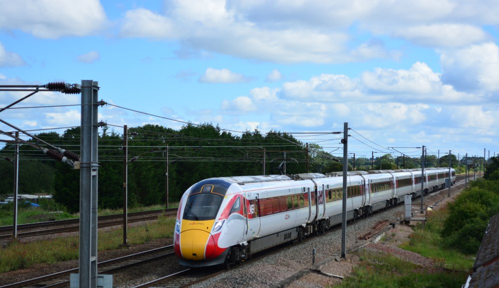 Class 801 EMU 801223 with the 1009 LNER Azuma service from York to London Kings Cross trainspotting Colton Junction footbridge