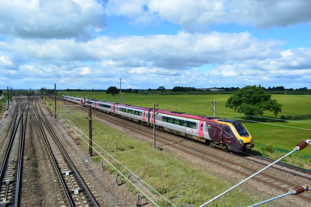 A pair of unidentified Class 220s with the 0615 CrossCountry service from Bristol Temple Meads to Edinburgh trainspotting Colton Junction footbridge