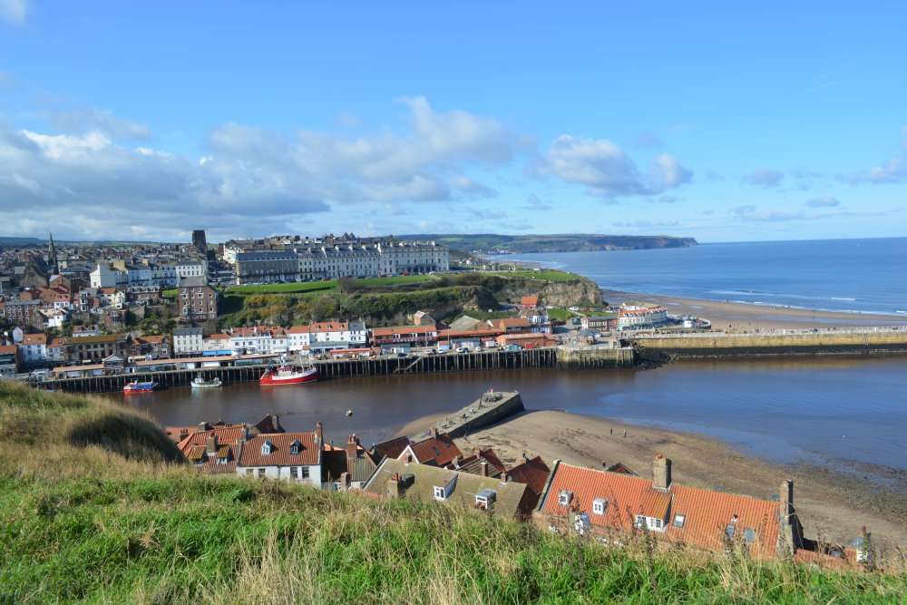  view across to West Cliff from the path up to St Mary's Church, Whitby, North Yorkshire, England