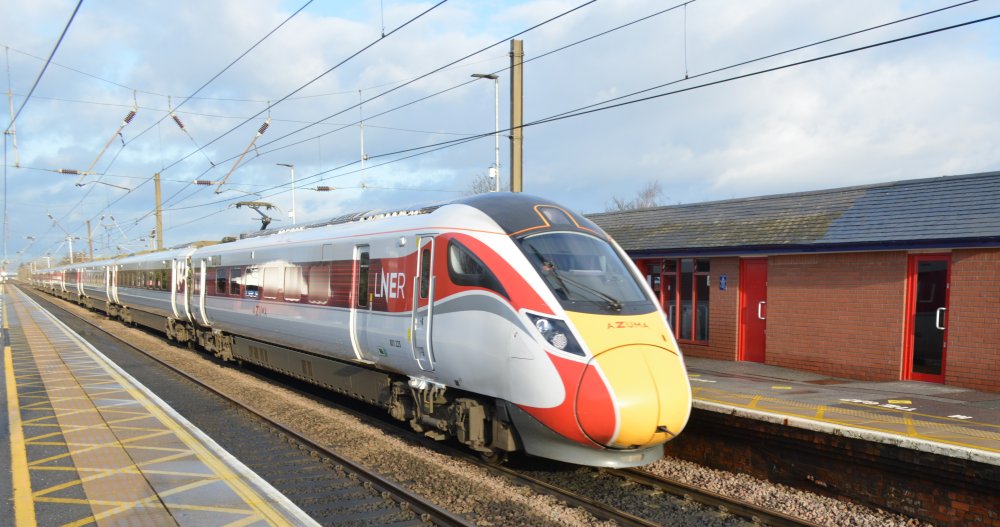 EMU Class 800 (sub-class 800/2) 801225 passing Northallerton station at high speed with an Azuma LNER Edinburgh - Kings Cross  Service Dec 17th 2020