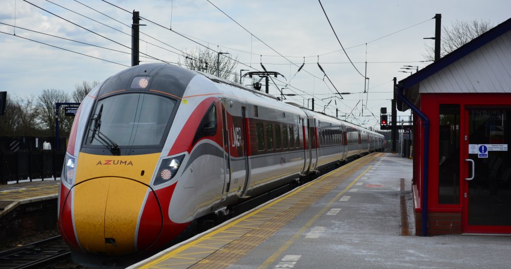 EMU Class 800 (9-car sub-class 800/2) 801230 stopping at Northallerton station with an Azuma LNER Kings Cross to Edinburgh Service Dec 17th 2020