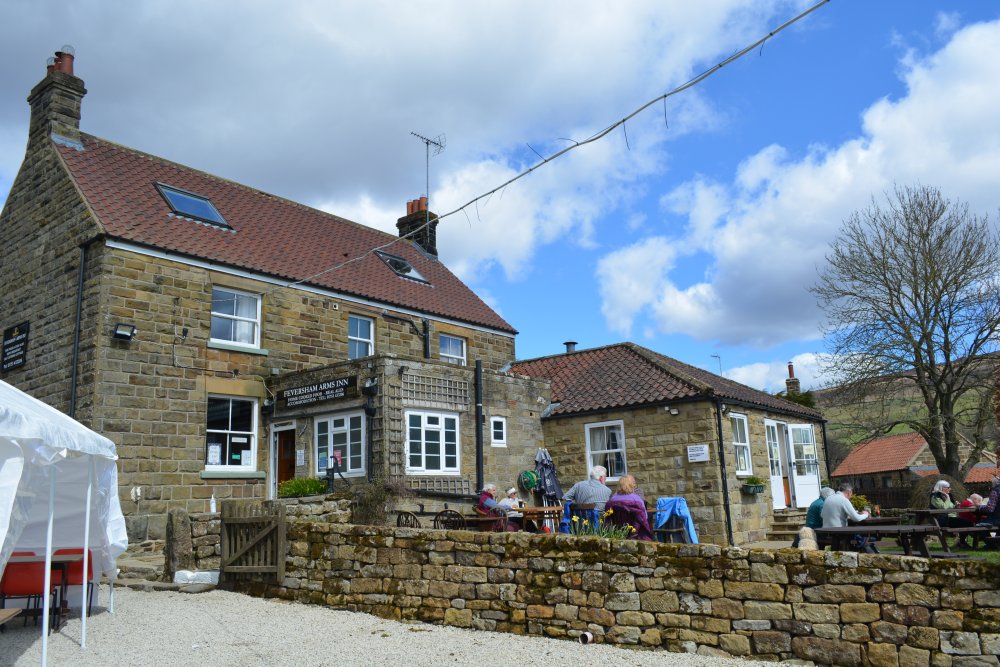 welcome sight of the Feversham Arms in Church Houses Daffy Walk, Farndale, North Yorkshire, England