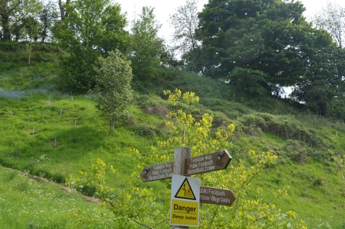 Cotherstone Castle once stood on this natural mound above the triple walking path signs circular walk Cotherstone Romaldkirk River Tees Co. Durham, England