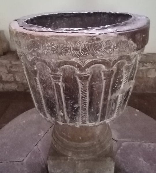Norman medieval font of St Agatha's Church, Easby Abbey, near Richmond, North Yorkshire, England